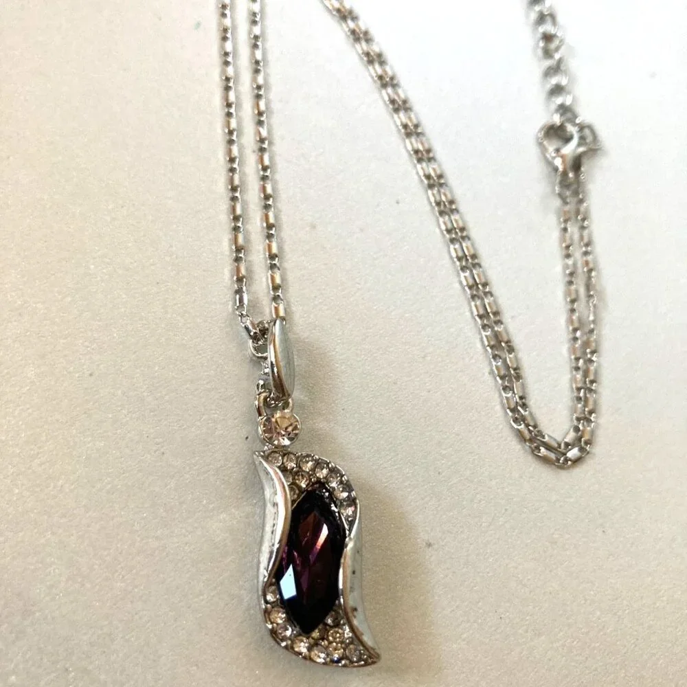NWOT dark violet crystal earrings, necklace, and bracelet jewelry set